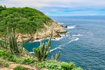 Huatulco, a coastal area located in the state of Oaxaca (Mexico) where the foothills of the Sierra Madre del Sur mountains meet the Pacific Ocean.