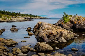 Coastal areas of Isle Royale were once submerged beneath prehistoric lake waters, and contain many tumbled boulders and other large rocks.