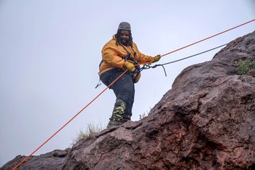 Jeff Jenkins goes rappelling at "The Box", a rugged canyon in Socorro, N.M., to challenge his fear of heights. 