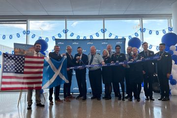JetBlue ribbon cutting ceremony celebrating flight to Scotland. 