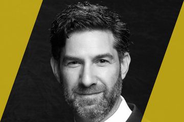 A black and white portrait of a person who is listed as an A List travel advisor/agent (names mentioned in text)
