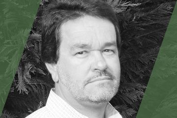 A black and white portrait of a person who is listed as an A List travel advisor/agent (names mentioned in text)