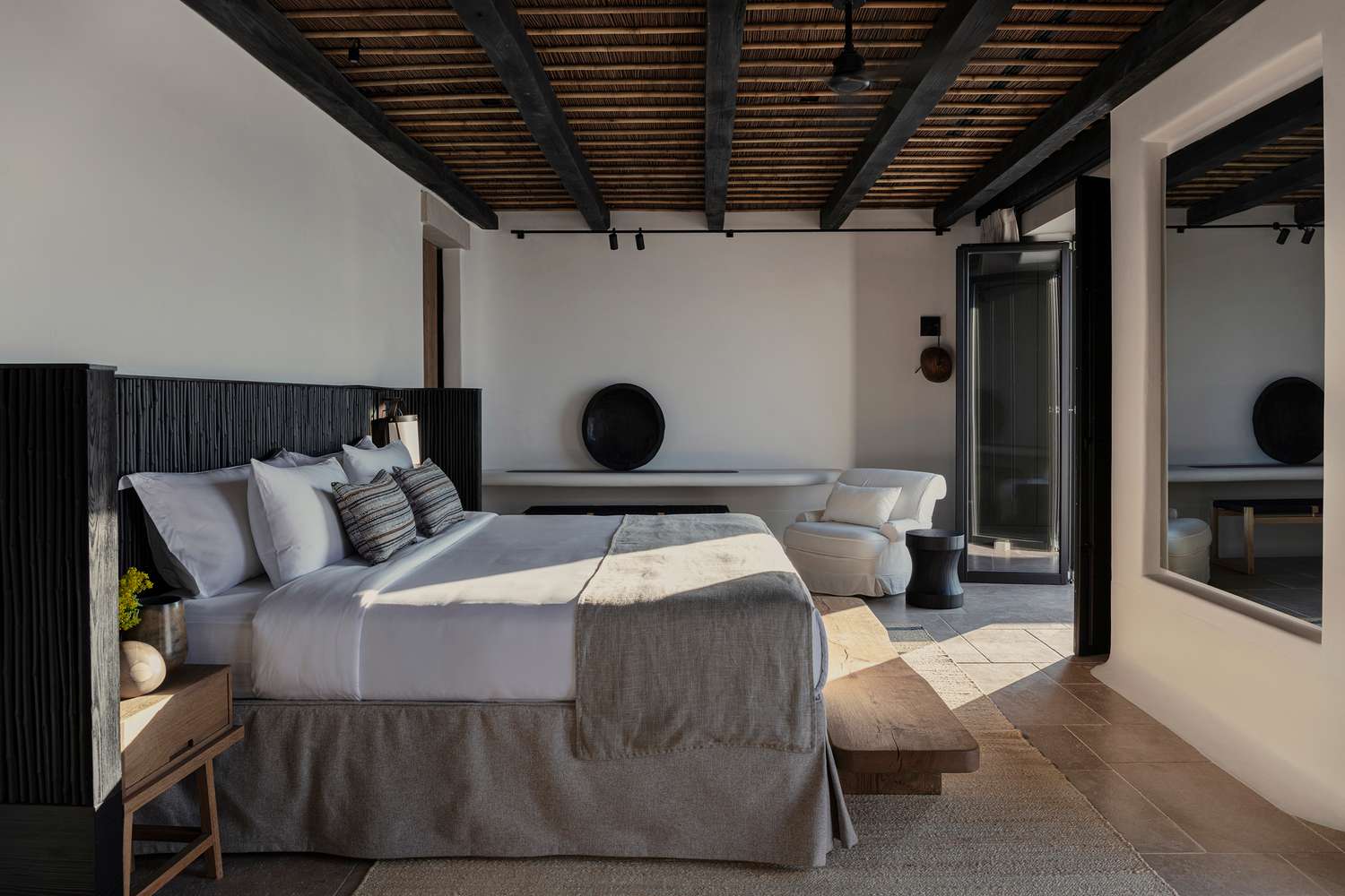 Sunlight streaming into a guest room at Kalesma Mykonos