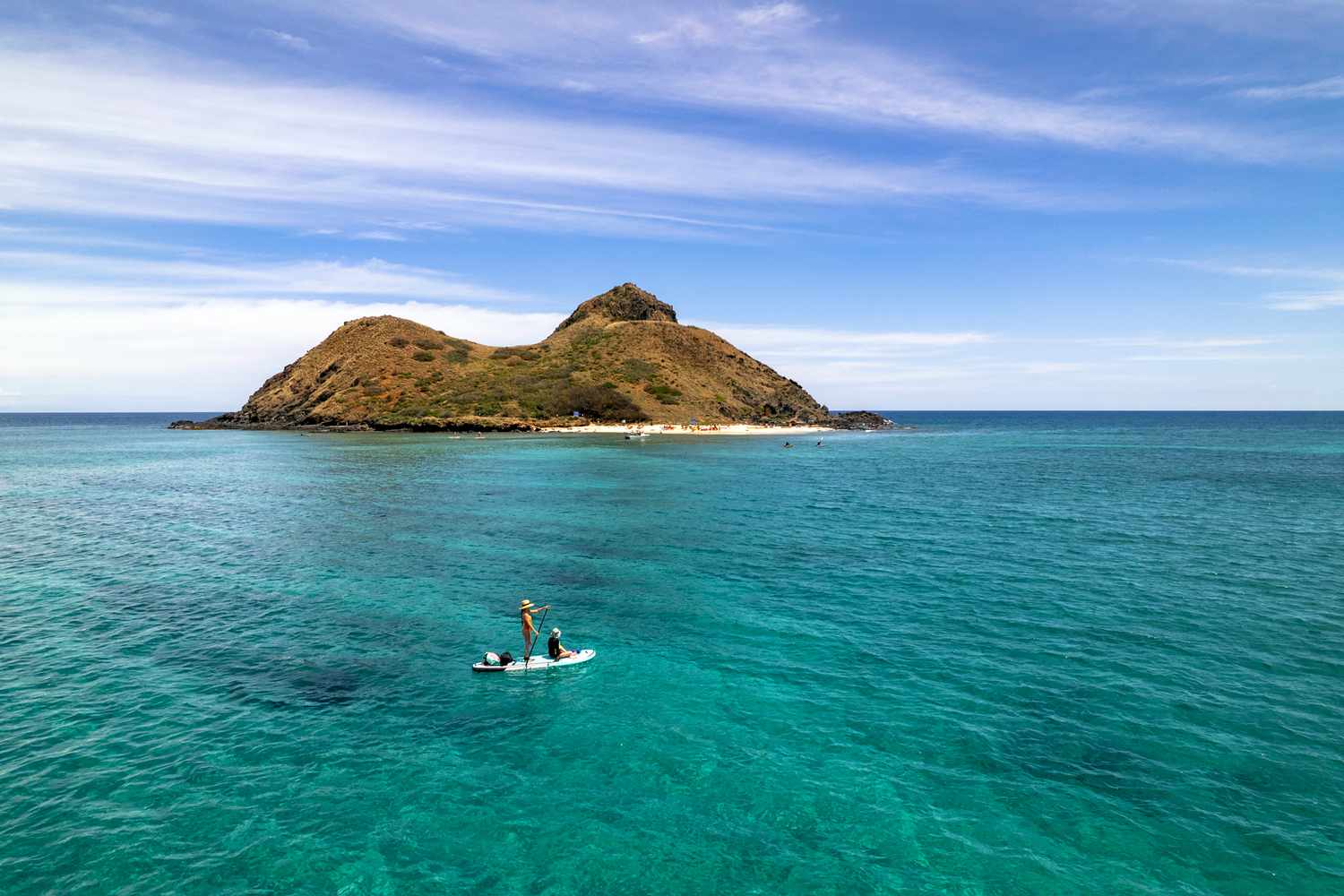 Mother and daughter paddleboarding at Lanikai Beach