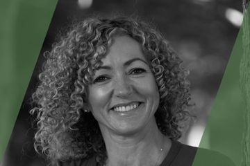 A black and white portrait of a person who is listed as an A List travel advisor/agent (names mentioned in text)