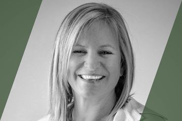 Black and white portrait of a person who is listed as an A List Travel Advisor 