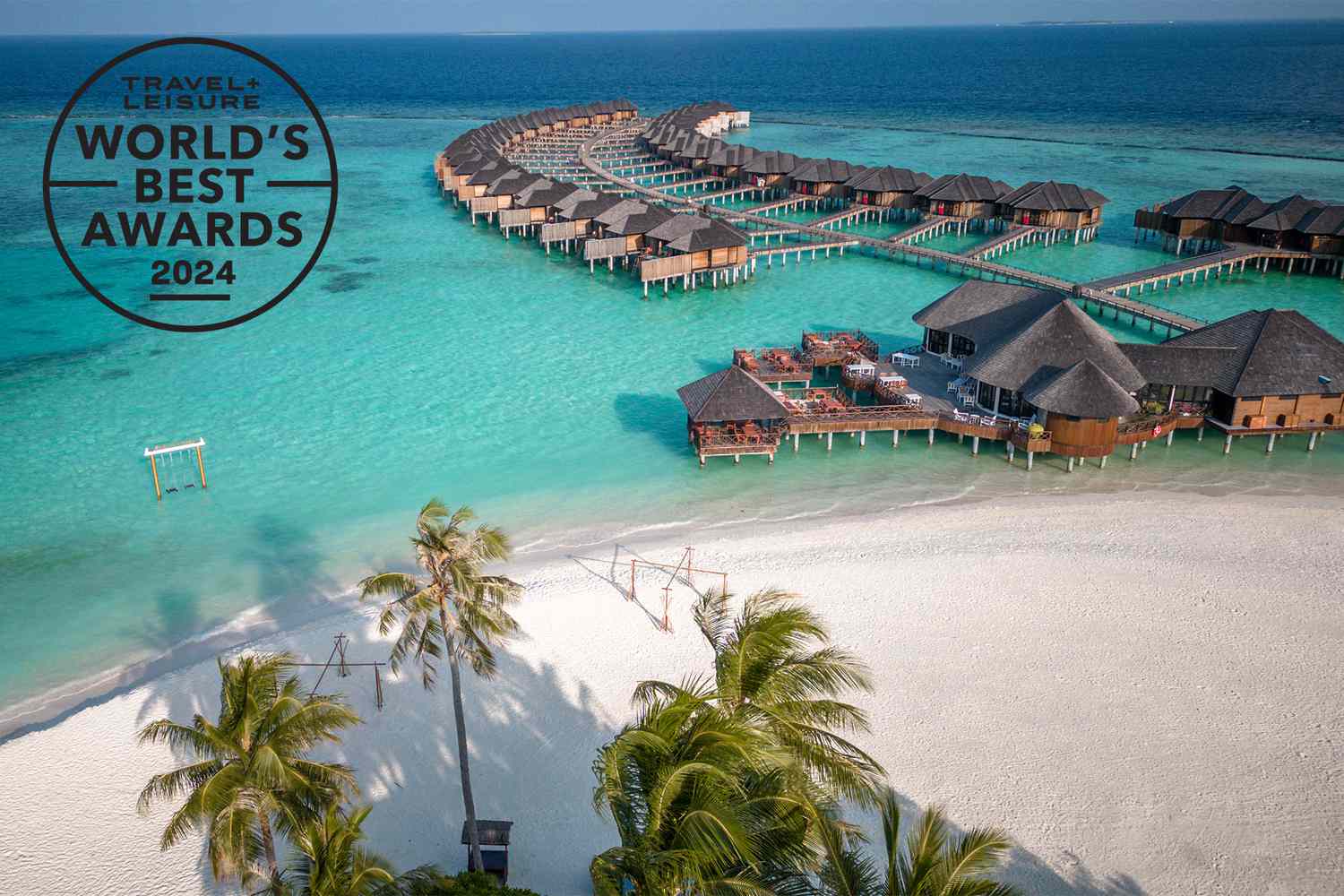 Maldives hotel beach resort on tropical Island with aerial drone view