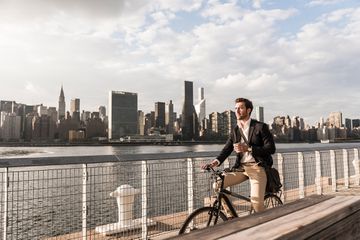 A man biking to work in NYC