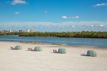 The white sandy beach of Marco Island, with hotels in the background