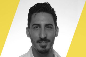 A black and white portrait of a person who is listed as an A List travel advisor/agent (names mentioned in text)