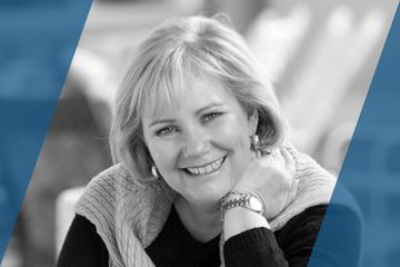 Black and white portrait of a person who is listed as an A List Travel Advisor 