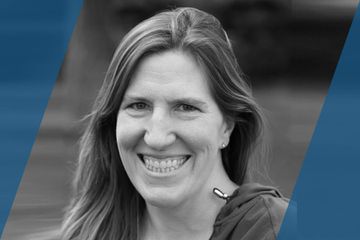 Black and white portrait of a person who is listed as an A List Travel Advisor 