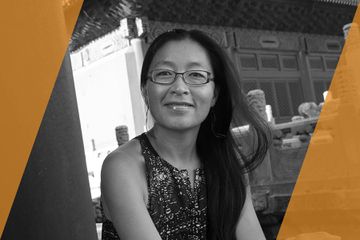 Black and white portrait of a person who is listed as an A List Travel Advisor 
