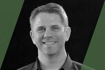 A black and white portrait of a person who is listed as an A List travel advisor/agent (names mentioned in text)