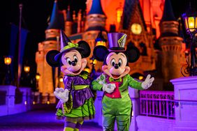 Mickey and Minnie in Halloween outfits