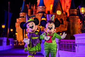 Mickey and Minnie in Halloween outfits