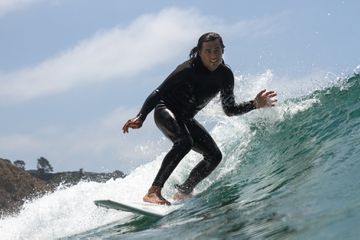 A man surfing in the ocean