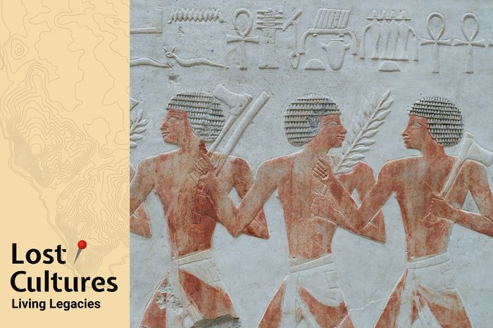 Nubian foot soldiers on an ancient Egyptian relief of painted limestone. New Kingdom 18th Dynasty from the temple of Queen Hatshepsut.