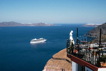 A cruise ship off the coast of Santorini, Greece