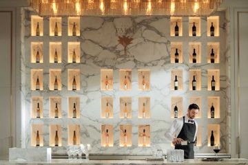 A bartender at RH Palm Court in San Francisco