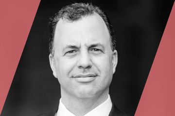 Black and white portrait of an A List Travel Advisor as mentioned in the text of the page
