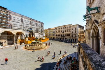 Perugia is the largest city of Umbria, Italy. It has a pristine medieval centre and an international student population. Its historic centre didn't change in more than 400 years, rises in a helter-skelter of cobbled alleys, arched stairways and squares framed by solemn churches and magnificent Gothic palaces. In this photo You can see the main square.