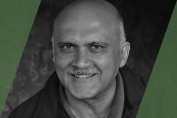 A headshot of Praveen Moman