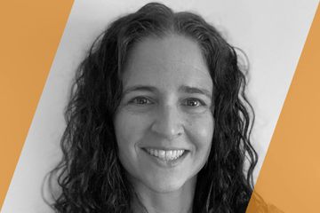 Black and white portrait of a person who is listed as an A List Travel Advisor 