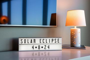 A sign inside the Omni Hotels x Southwest Eclipse hotel room 