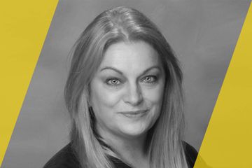 A black and white portrait of a person who is listed as an A List travel advisor/agent (names mentioned in text)