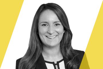 Black and white portrait of a person who is listed as an A List Travel Advisor 