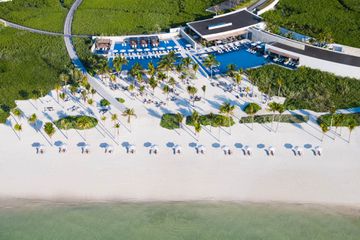 Aerial view of the beach and pools at St. Regis Kanai, Riviera Maya