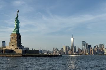 View of the Statue of Liberty and NYC skyline from the water 