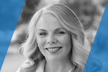 Black and white portrait of a person who is listed as an A List Travel Advisor 