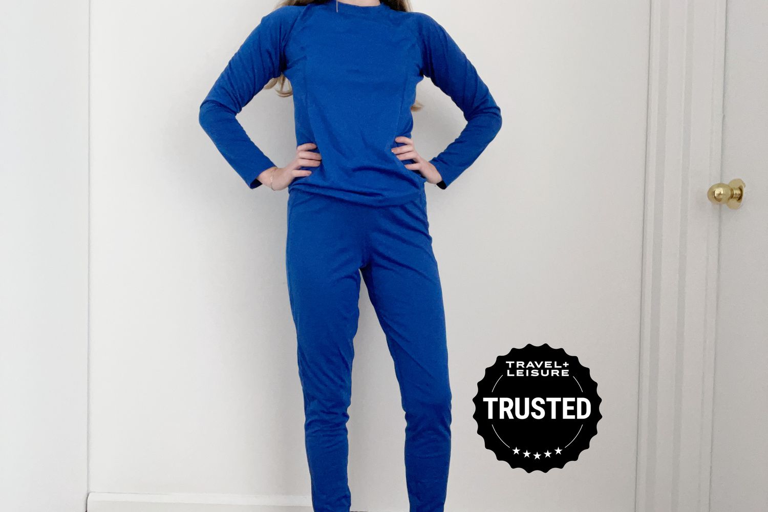 Person wearing Outdoor Research Women's Alpine Onset Merino 150 Crew top and pants