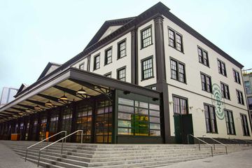 Exterior of the Tin Building food hall in New York