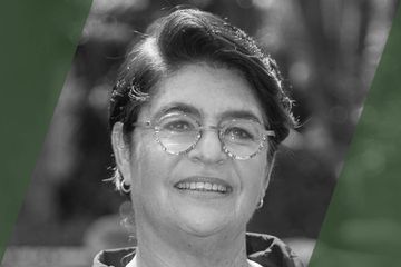 Black and white portrait of a person who is listed as an A List Travel Advisor 