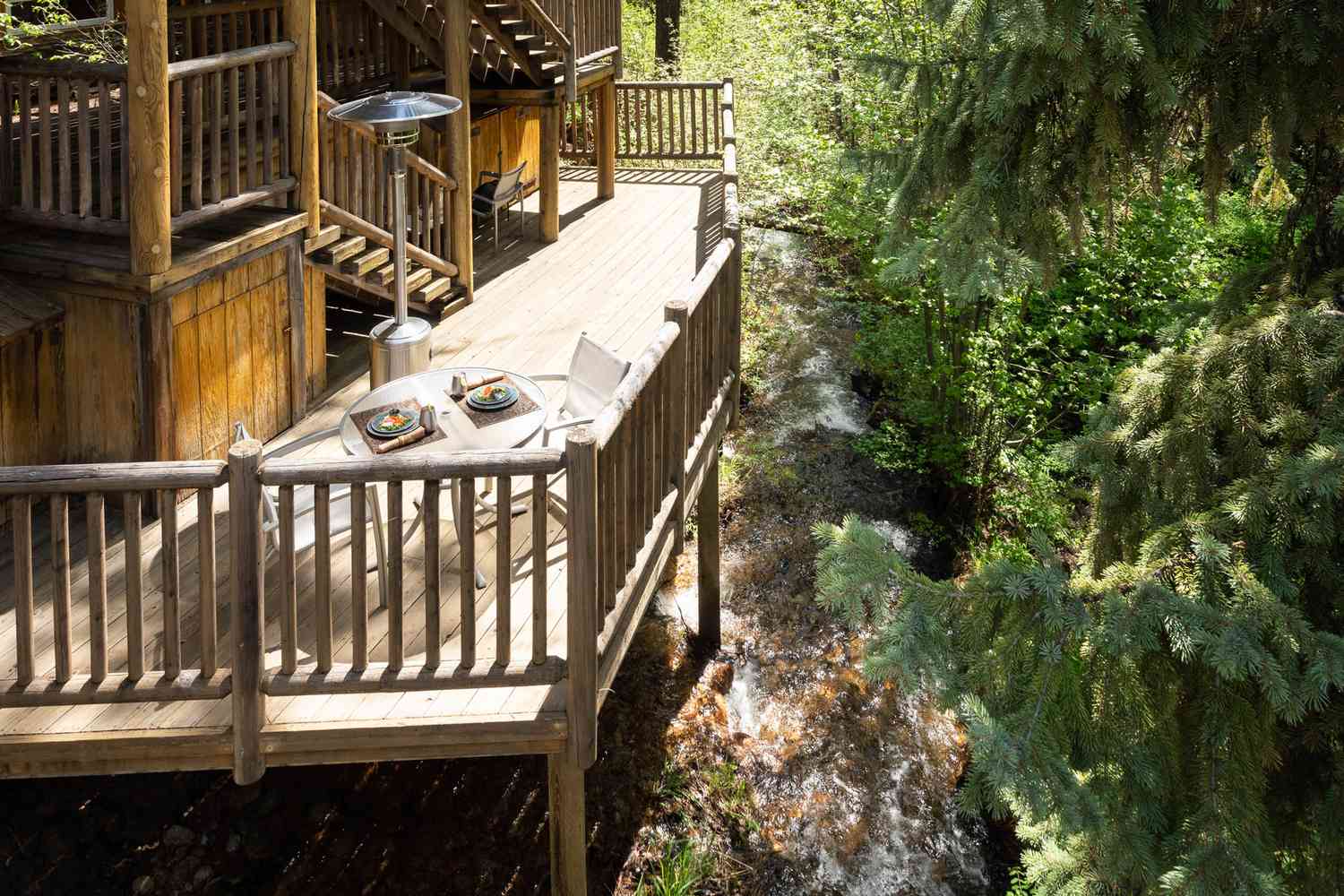 Terrace and forest at the Triple Creek Ranch resort
