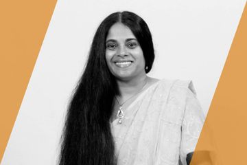 Black and white portrait of a person who is listed as an A List Travel Advisor 