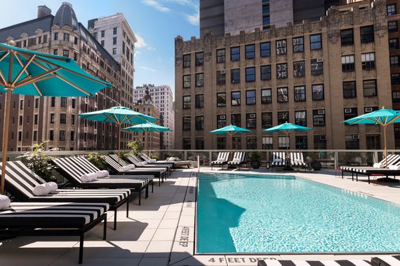 Pool deck with city views at the Virgin New York City hotel